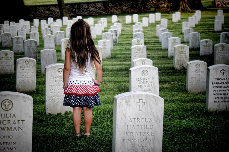 Memorial Day girl in cemetary