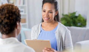 Social Worker working with client 