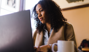 social worker working on a laptop