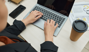 social worker working on a laptop