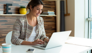 social worker working on a laptop