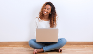 Social worker safely using her laptop