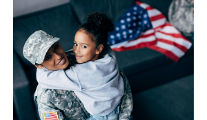 A female veteran with her child 