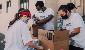 NGO volunteers distributing food and medicine 