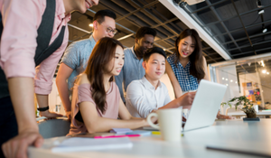 team members at a nonprofit looking at a case management solution 