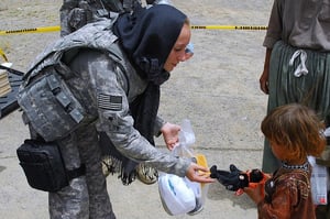 female soldier working mom
